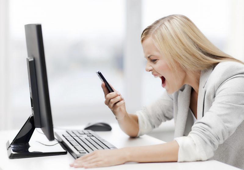 picture of angry woman shouting at phone